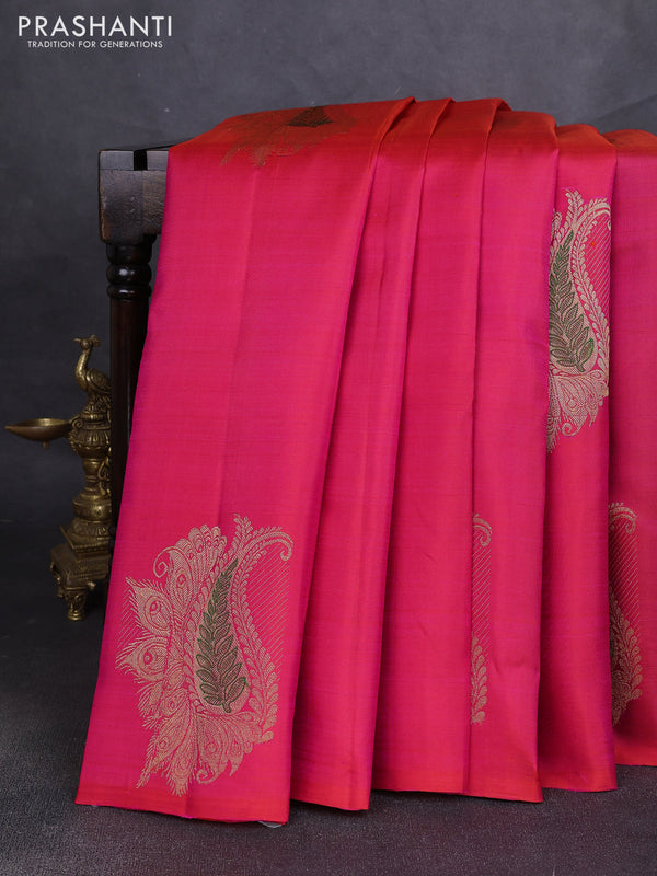 Pure kanchipuram silk saree dual shade of pinkish orange and green with zari woven buttas in borderless style