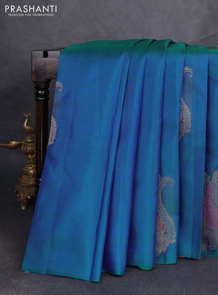 Pure kanchipuram silk saree cs blue and dual shade of pinkish orange with zari woven buttas in borderless style