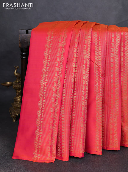 Pure kanchipuram silk saree dual shade of pinkish orange and blue with allover zari weaves & buttas in borderless style