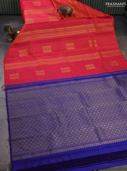 Pure kanchipuram silk saree dual shade of pinkish orange and blue with allover zari weaves & buttas in borderless style