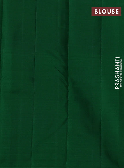 Pure kanchipuram silk saree pink and green with allover zari woven buttas in borderless style