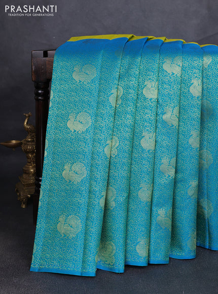 Pure kanchipuram silk saree dual shade if greenish yellow and teal blue with half & half style and long annam zari woven border