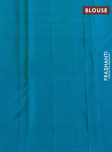 Pure kanchipuram silk saree dual shade if greenish yellow and teal blue with half & half style and long annam zari woven border