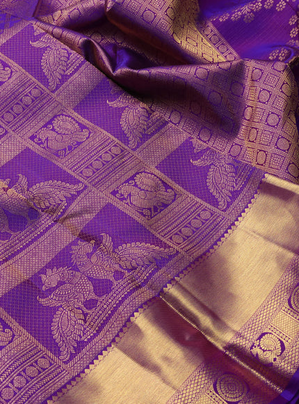 Pure kanchipuram silk saree violet with allover zari woven brocade weaves and rich zari woven border