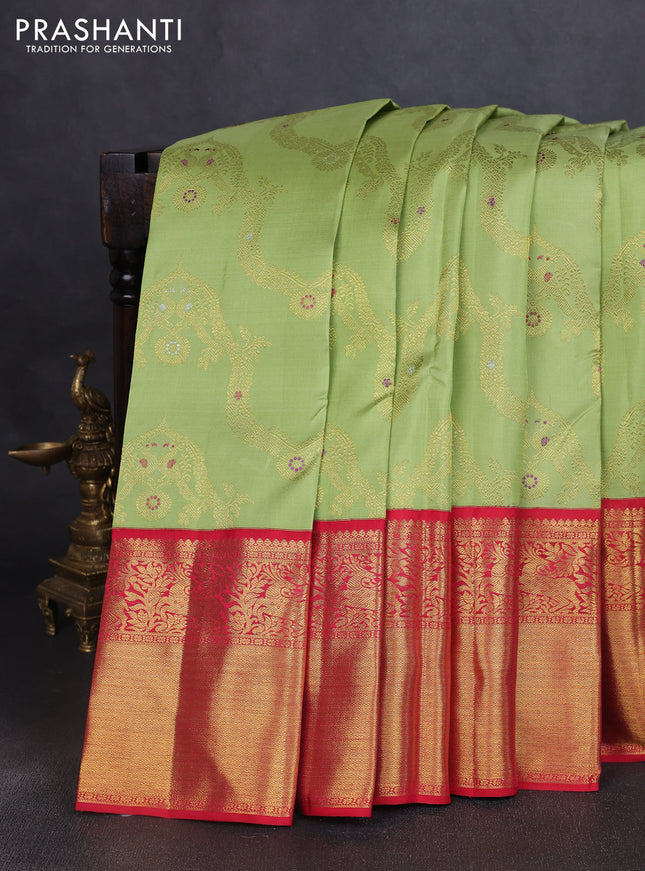Pure kanchipuram silk saree pista green and red with allover zari woven jewellery design and long rich zari woven border