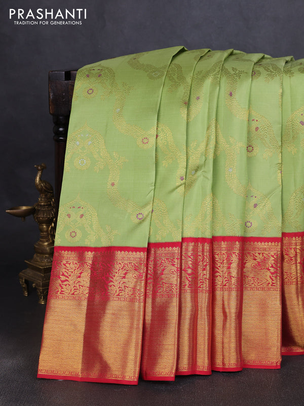 Pure kanchipuram silk saree pista green and red with allover zari woven jewellery design and long rich zari woven border