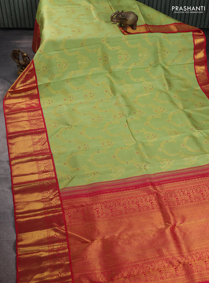 Pure kanchipuram silk saree pista green and red with allover zari woven jewellery design and long rich zari woven border