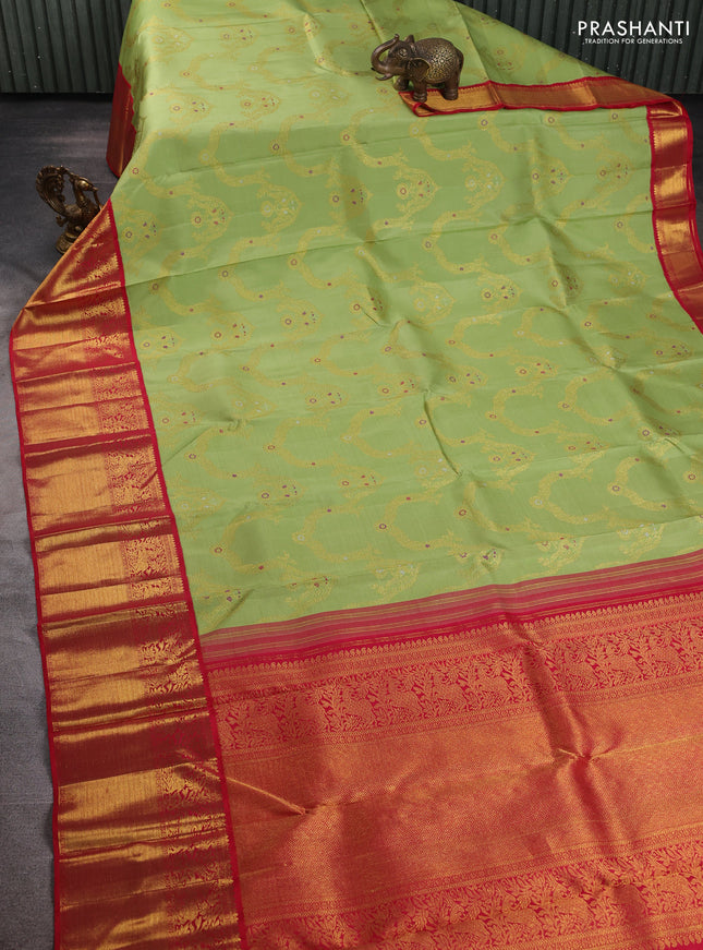 Pure kanchipuram silk saree pista green and red with allover zari woven jewellery design and long rich zari woven border