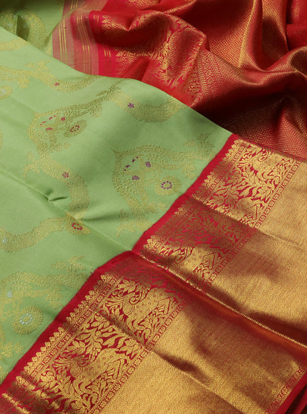 Pure kanchipuram silk saree pista green and red with allover zari woven jewellery design and long rich zari woven border