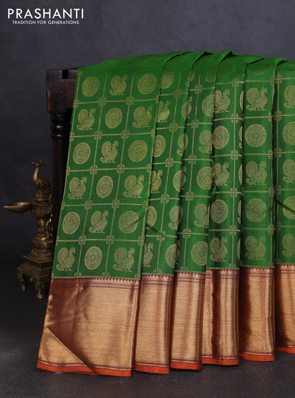 Pure kanchipuram silk saree green and maroon with allover zari woven checked brocade pattern and long rich zari woven border