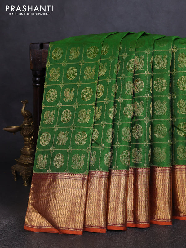 Pure kanchipuram silk saree green and maroon with allover zari woven checked brocade pattern and long rich zari woven border