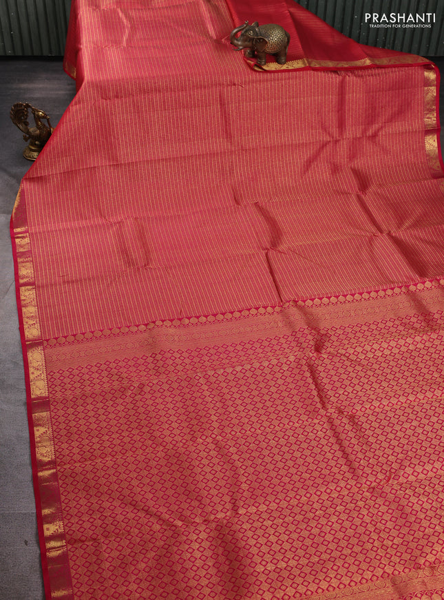 Pure kanchipuram silk saree dual shade of pinkish orange with allover zari woven brocade weaves and temple & annam zari woven border