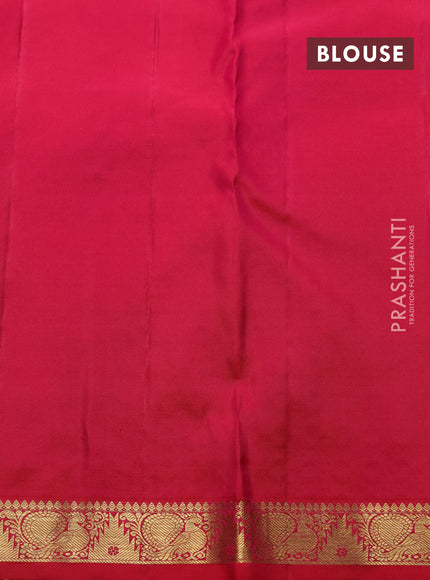 Pure kanchipuram silk saree dual shade of pinkish orange with allover zari woven brocade weaves and temple & annam zari woven border