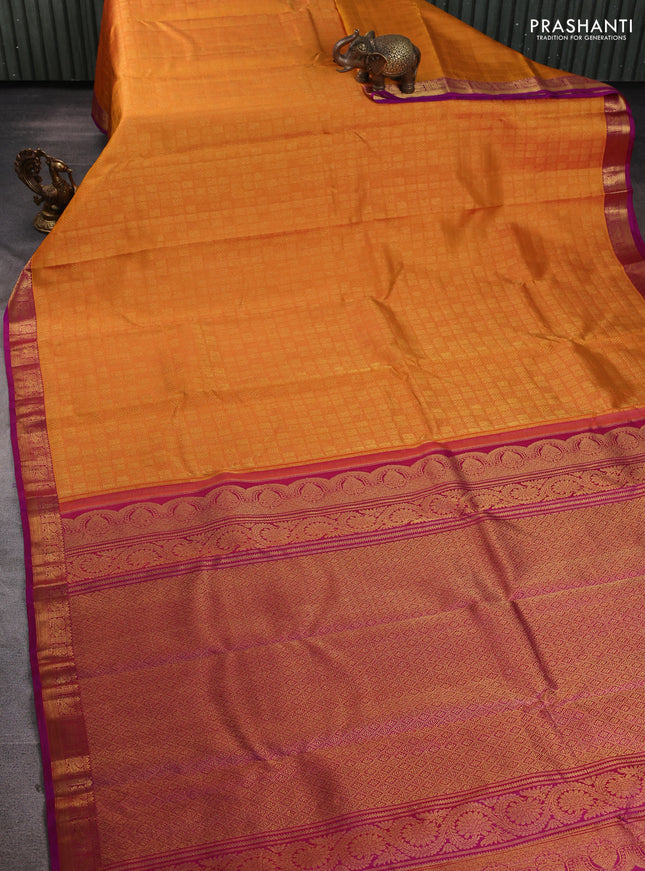 Pure kanchipuram silk saree mustard yellow and purple with allover zari woven brocade weaves and zari woven border