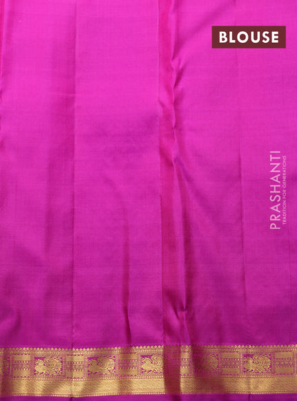 Pure kanchipuram silk saree dual shade of pinkish orange and purple with allover zari woven brocade weaves and zari woven border