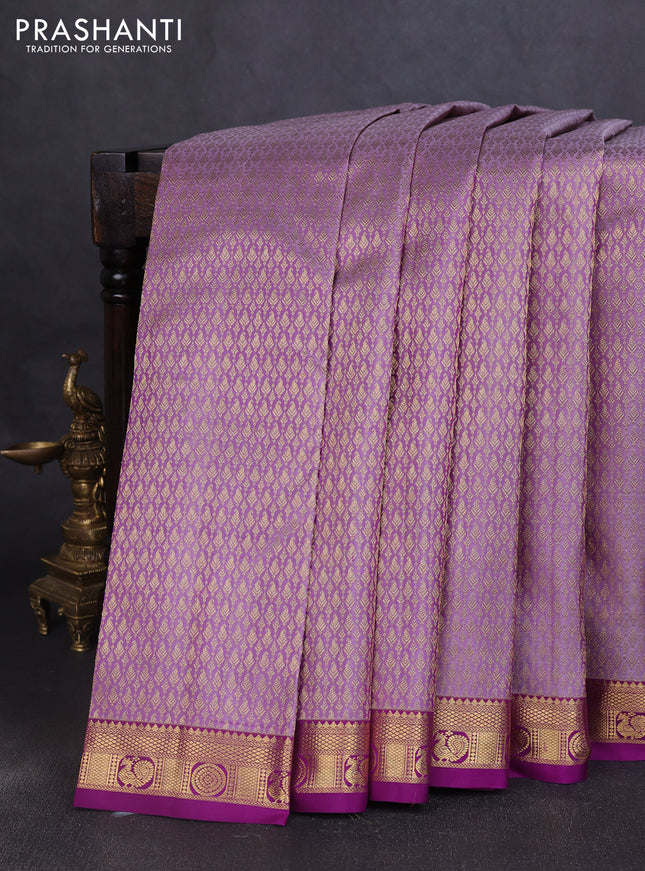 Pure kanchipuram silk saree pastel purple and purple with allover zari woven brocade weaves and zari woven border