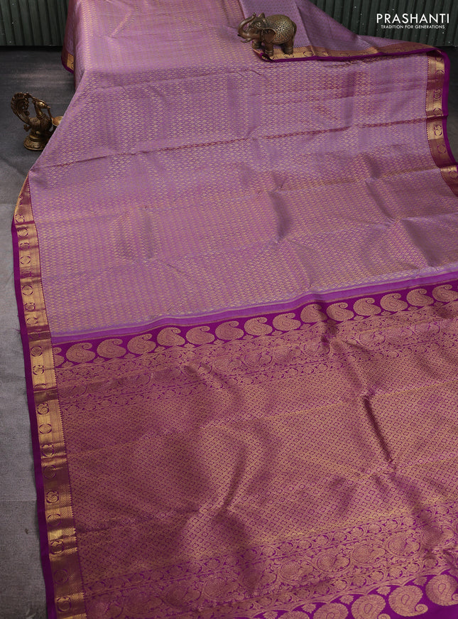 Pure kanchipuram silk saree pastel purple and purple with allover zari woven brocade weaves and zari woven border
