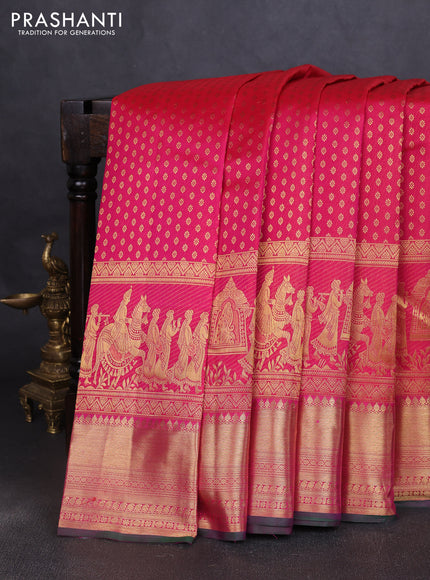 Pure kanchipuram silk saree dual shade of pinkish orange and green with allover zari woven butta weaves and long wedding design zari woven border