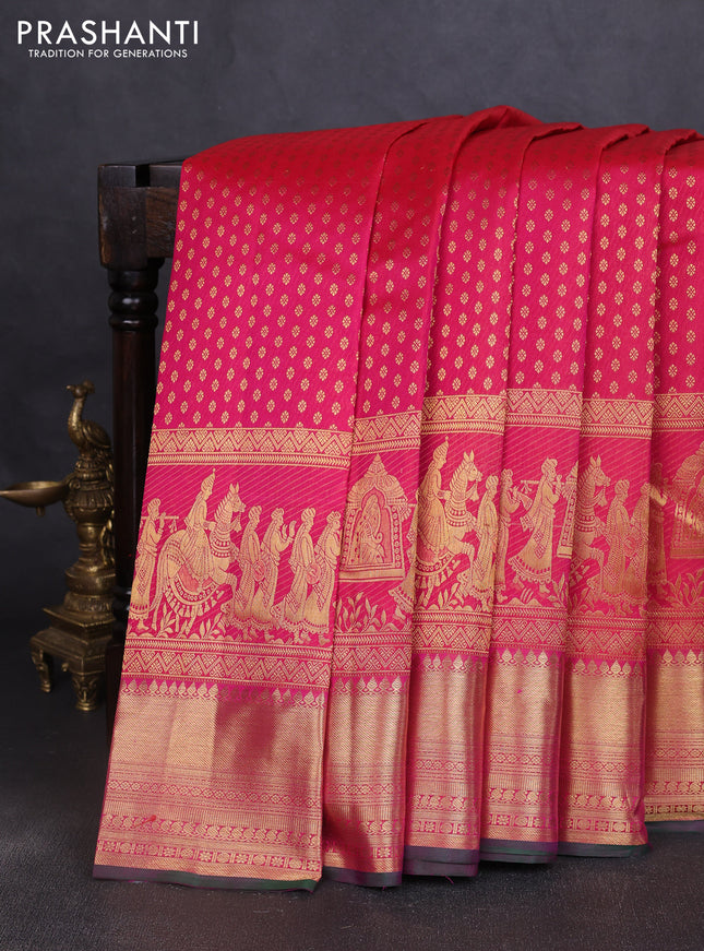 Pure kanchipuram silk saree dual shade of pinkish orange and green with allover zari woven butta weaves and long wedding design zari woven border