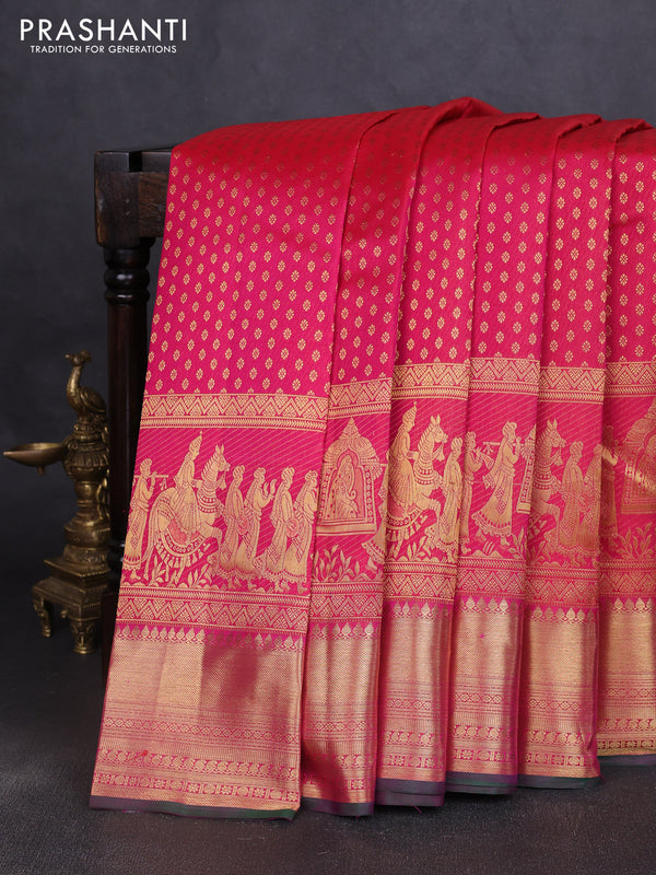 Pure kanchipuram silk saree dual shade of pinkish orange and green with allover zari woven butta weaves and long wedding design zari woven border