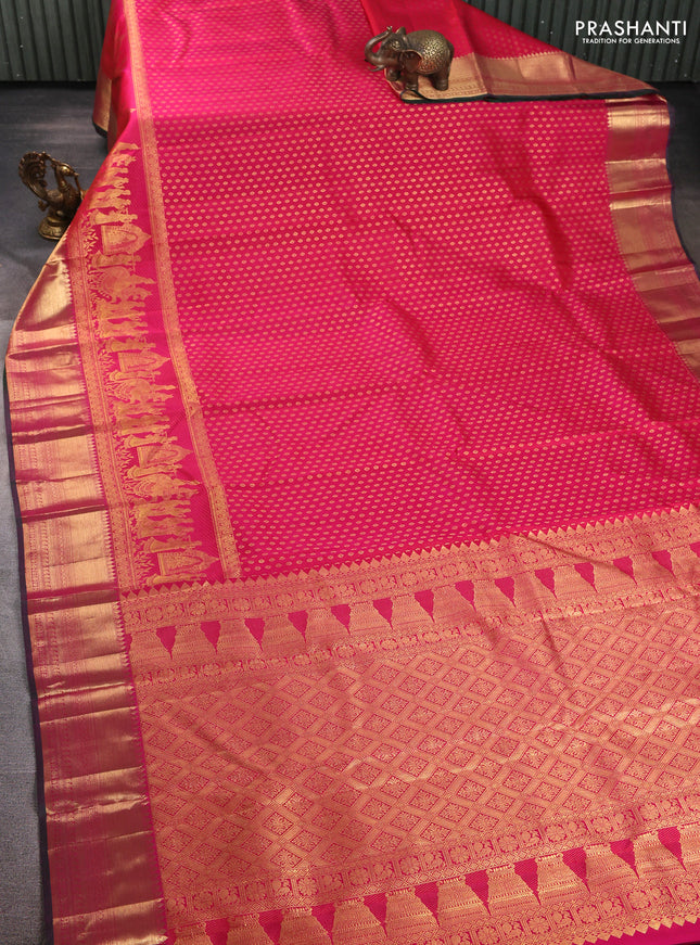 Pure kanchipuram silk saree dual shade of pinkish orange and green with allover zari woven butta weaves and long wedding design zari woven border
