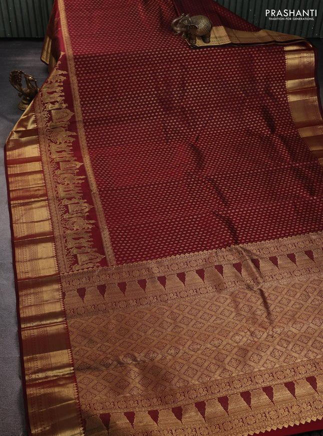 Pure kanchipuram silk saree maroon with allover zari woven butta weaves and long wedding design zari woven border
