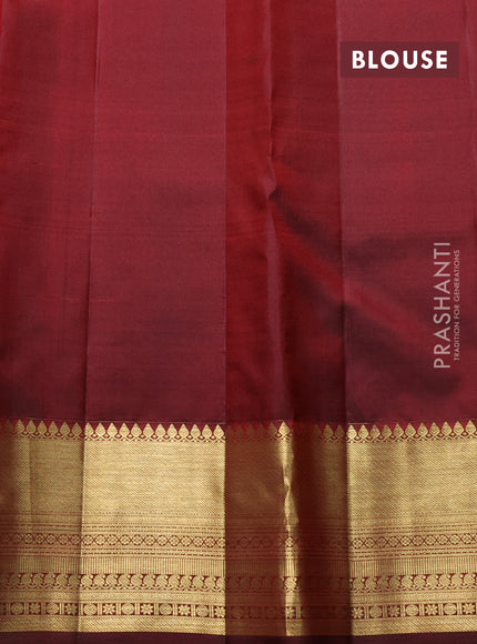 Pure kanchipuram silk saree maroon with allover zari woven butta weaves and long wedding design zari woven border