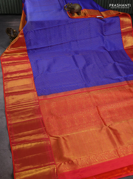 Pure kanchipuram silk saree royal blue and dual shade of pinkish orange with allover zari woven butta weaves and long rich zari woven border