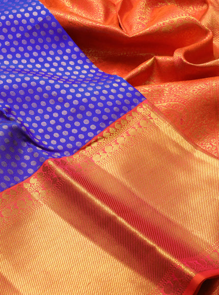Pure kanchipuram silk saree royal blue and dual shade of pinkish orange with allover zari woven butta weaves and long rich zari woven border