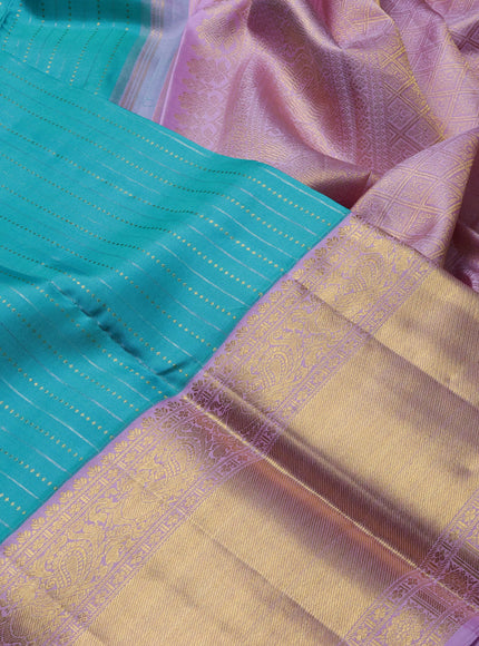 Pure kanchipuram silk saree teal blue and mild lavender with allover silver & gold zari woven buttas and long rich zari woven korvai border