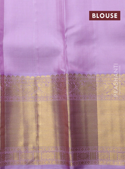 Pure kanchipuram silk saree teal blue and mild lavender with allover silver & gold zari woven buttas and long rich zari woven korvai border