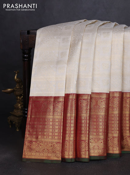 Pure kanchipuram silk saree off white and maroon with allover zari woven brocade weaves and long rich annam zari woven border