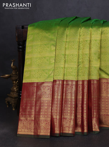 Pure kanchipuram silk saree light green and maroon with allover zari woven brocade weaves and long rich annam zari woven border