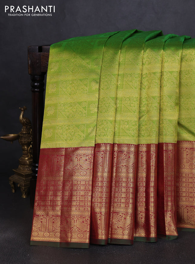 Pure kanchipuram silk saree light green and maroon with allover zari woven brocade weaves and long rich annam zari woven border