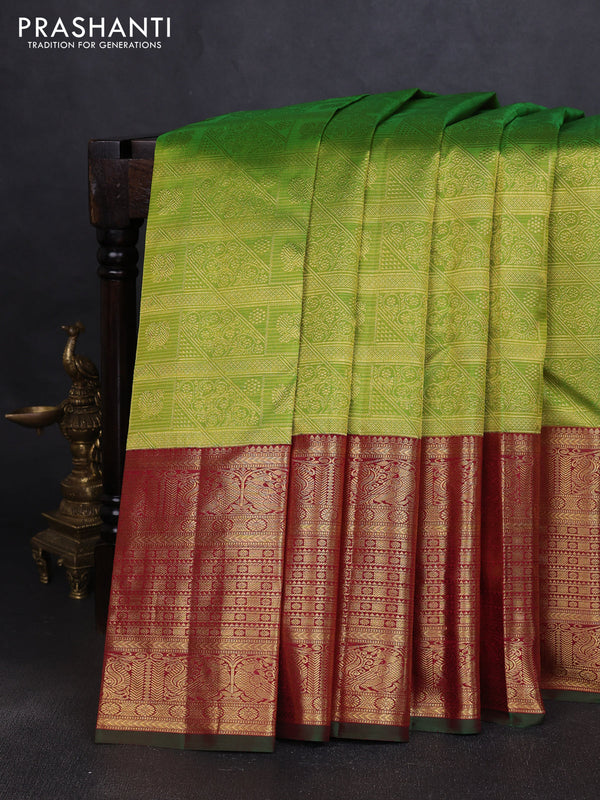 Pure kanchipuram silk saree light green and maroon with allover zari woven brocade weaves and long rich annam zari woven border