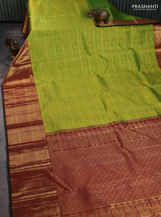 Pure kanchipuram silk saree light green and maroon with allover zari woven brocade weaves and long rich annam zari woven border