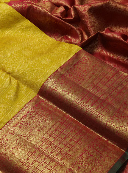 Pure kanchipuram silk saree yellow and maroon with allover zari woven brocade weaves and long rich annam zari woven border