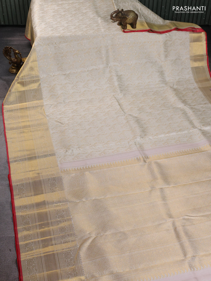 Pure kanchipuram silk saree cream and red with allover zari woven brocade weaves and long zari woven border