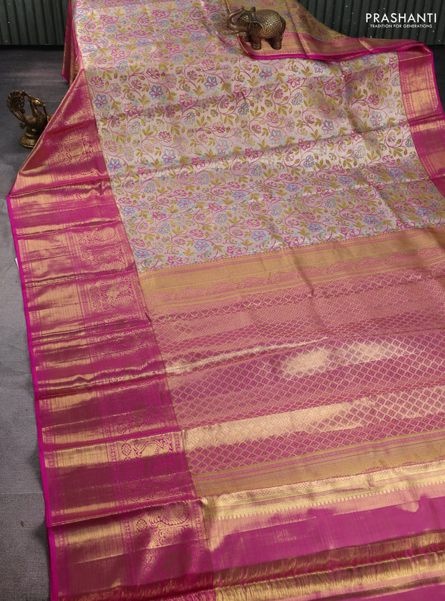 Pure kanchipuram tissue silk saree gold and pink with allover zari woven floral brocade weaves and long rich annam zari woven border