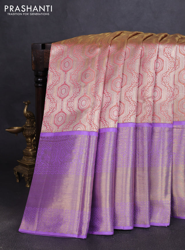 Pure kanchipuram tissue silk saree pastel peach and lavender with allover zari woven brocade weaves and long rich zari woven border