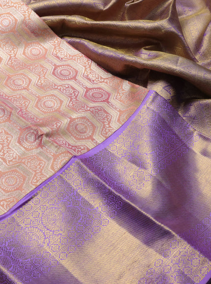 Pure kanchipuram tissue silk saree pastel peach and lavender with allover zari woven brocade weaves and long rich zari woven border
