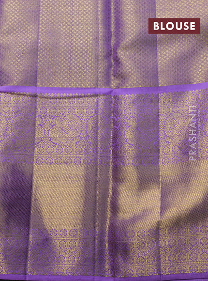 Pure kanchipuram tissue silk saree pastel peach and lavender with allover zari woven brocade weaves and long rich zari woven border