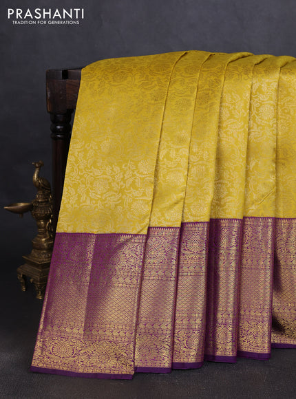 Pure kanchipuram silk saree mustard yellow and purple with allover zari woven brocade weaves and long zari woven border