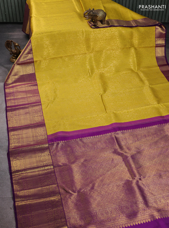 Pure kanchipuram silk saree mustard yellow and purple with allover zari woven brocade weaves and long zari woven border