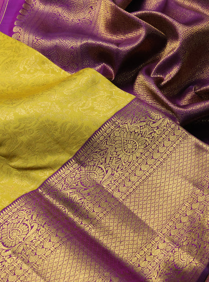 Pure kanchipuram silk saree mustard yellow and purple with allover zari woven brocade weaves and long zari woven border