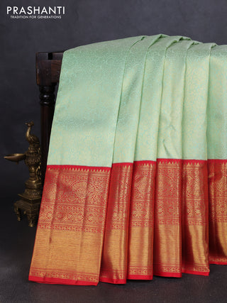 Pure kanchipuram silk saree pastel green and red with allover zari woven brocade weaves and long zari woven border