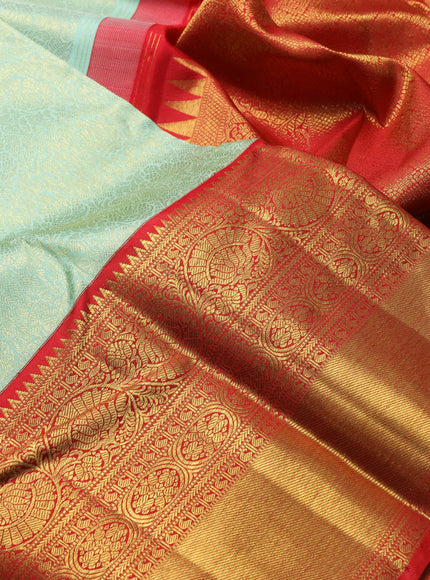 Pure kanchipuram silk saree pastel green and red with allover zari woven brocade weaves and long zari woven border