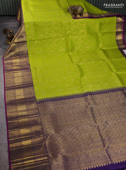 Pure kanchipuram silk saree light green and purple with allover zari woven brocade weaves and long zari woven border