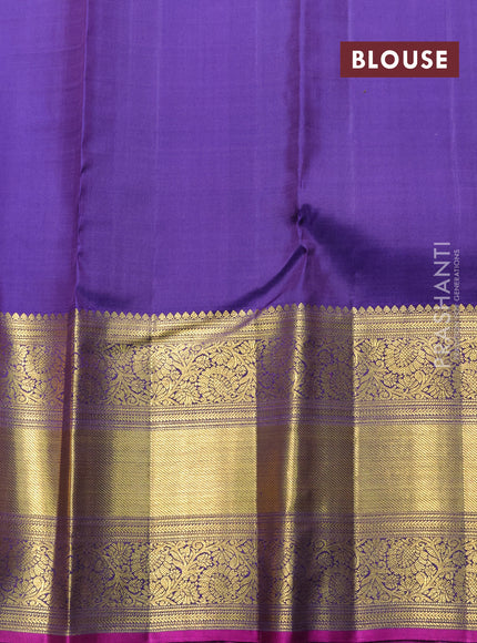 Pure kanchipuram silk saree light green and purple with allover zari woven brocade weaves and long zari woven border