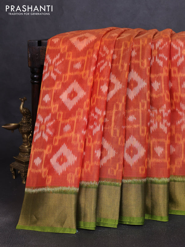 Ikat silk cotton saree orange and light green with allover ikat weaves and zari woven border